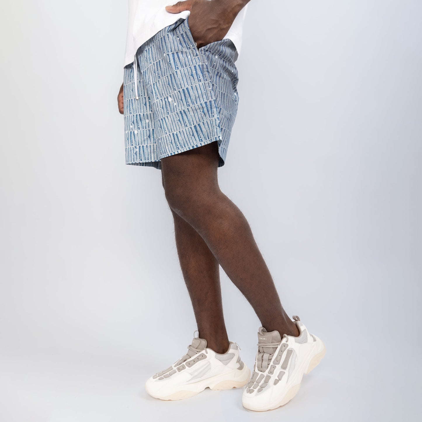 Pantaloneta Azul AMIRI Multilogo
